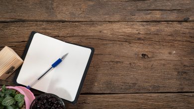 علم، زندهگی و توسعه 6 notebook on a table free photo