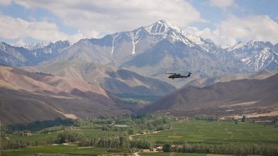 1280px Black Hawk flying over a valley in Bamyan